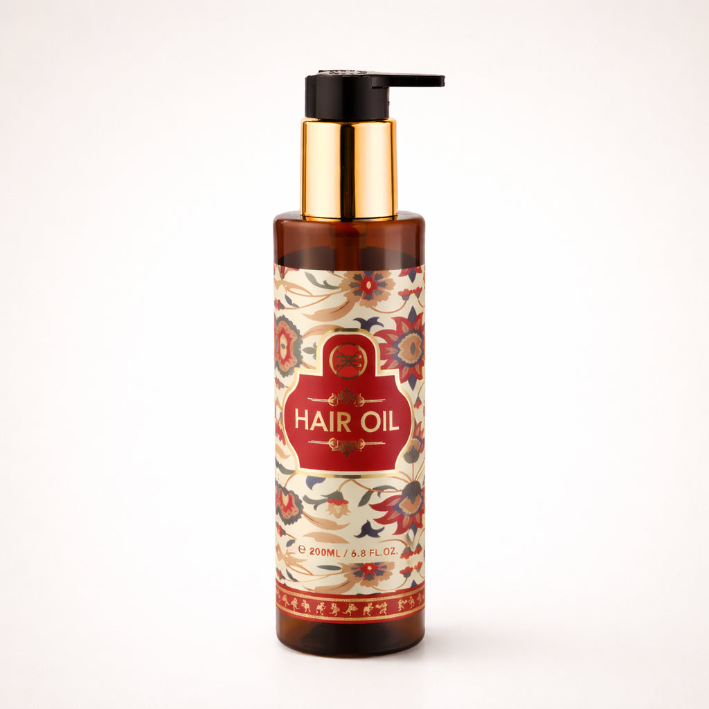 Tamra Ayurveda Hair oil bottle with decorative label on a white background