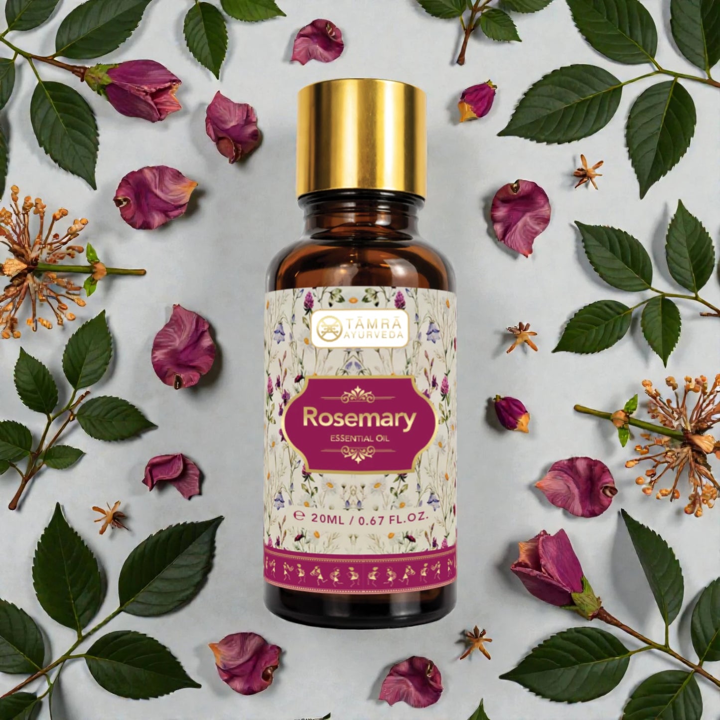 Tamra Rosemary essential oil bottle with a floral label on a background of leaves and flowers.