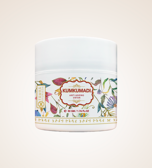 Tamra Kumkumadi anti-ageing cream jar with floral design on a light background