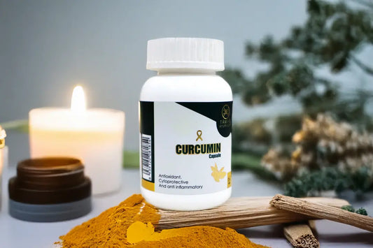 Bottle of Curcumin capsules with turmeric powder and cinnamon sticks on a blurred natural background