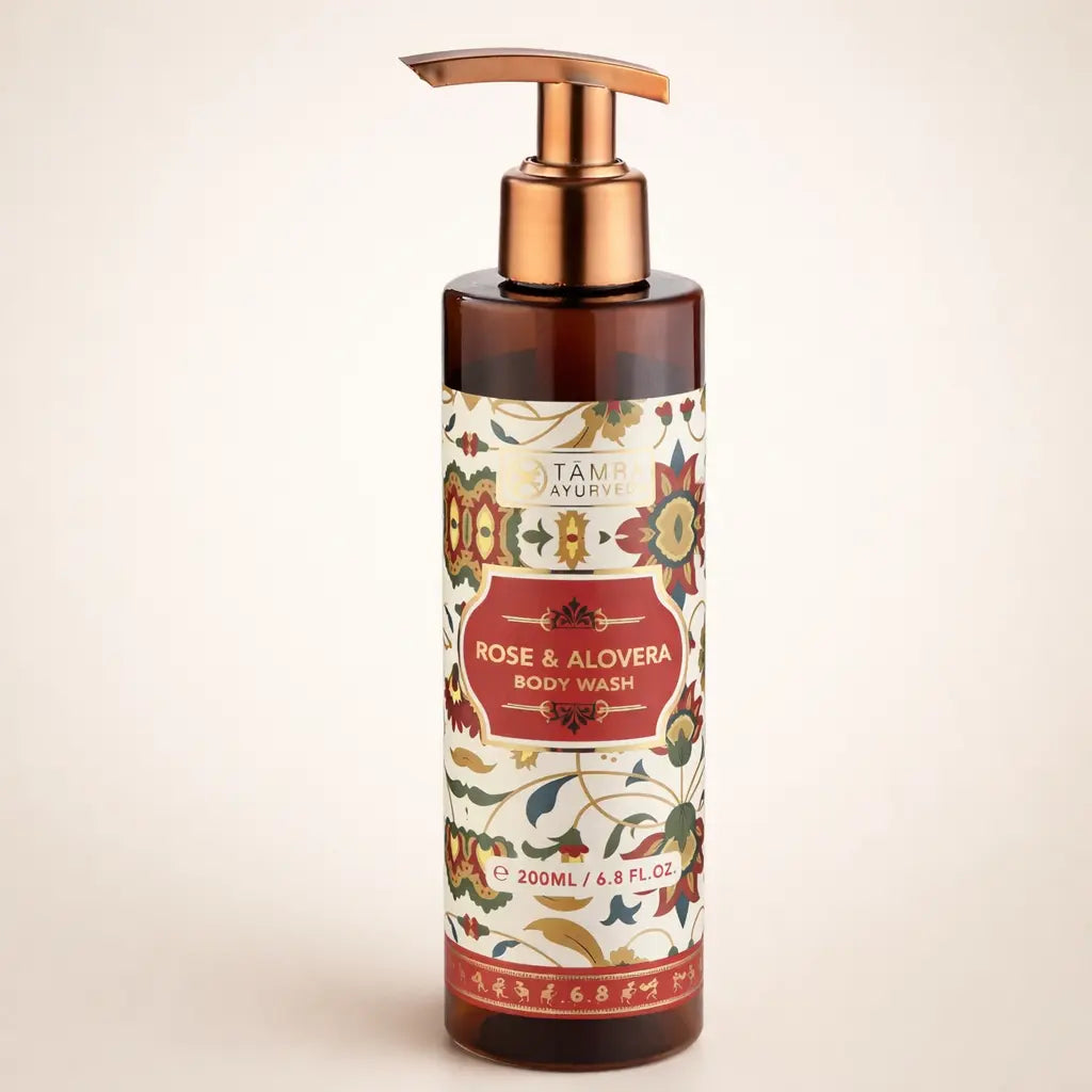 Body wash bottle with floral label on a beige background