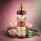 Body wash bottle with rose and aloe vera on a pink background