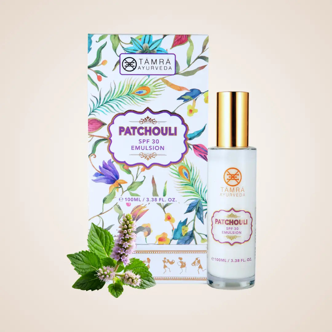Tamra Ayurveda Patchouli SPF 30 Emulsion bottle and packaging on a beige background