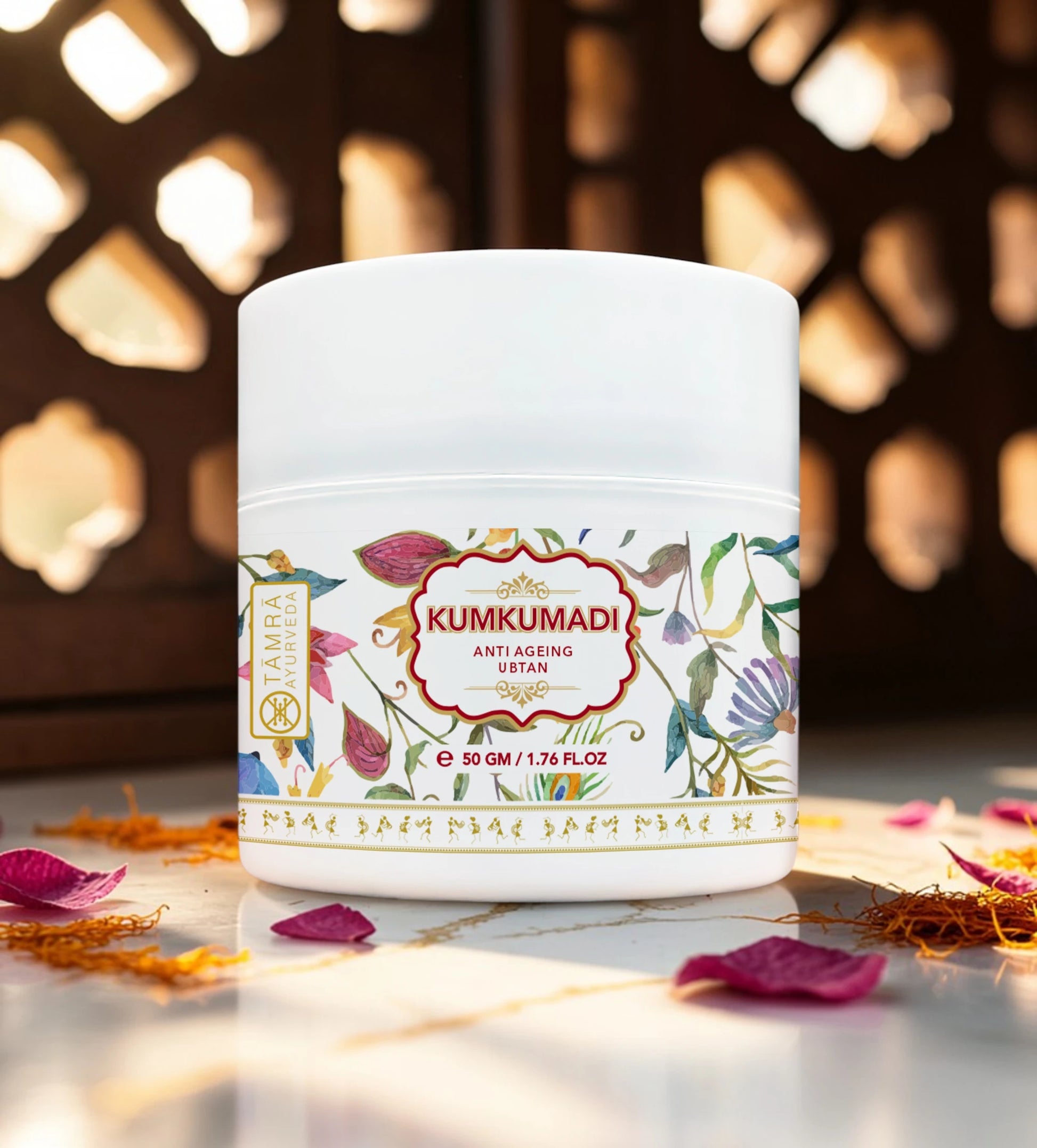 Kumkumadi skincare jar with decorative label on a blurred background
