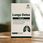 Box of Támra Ayurveda Lungs Detox Tablets on a wooden surface with a blurred background
