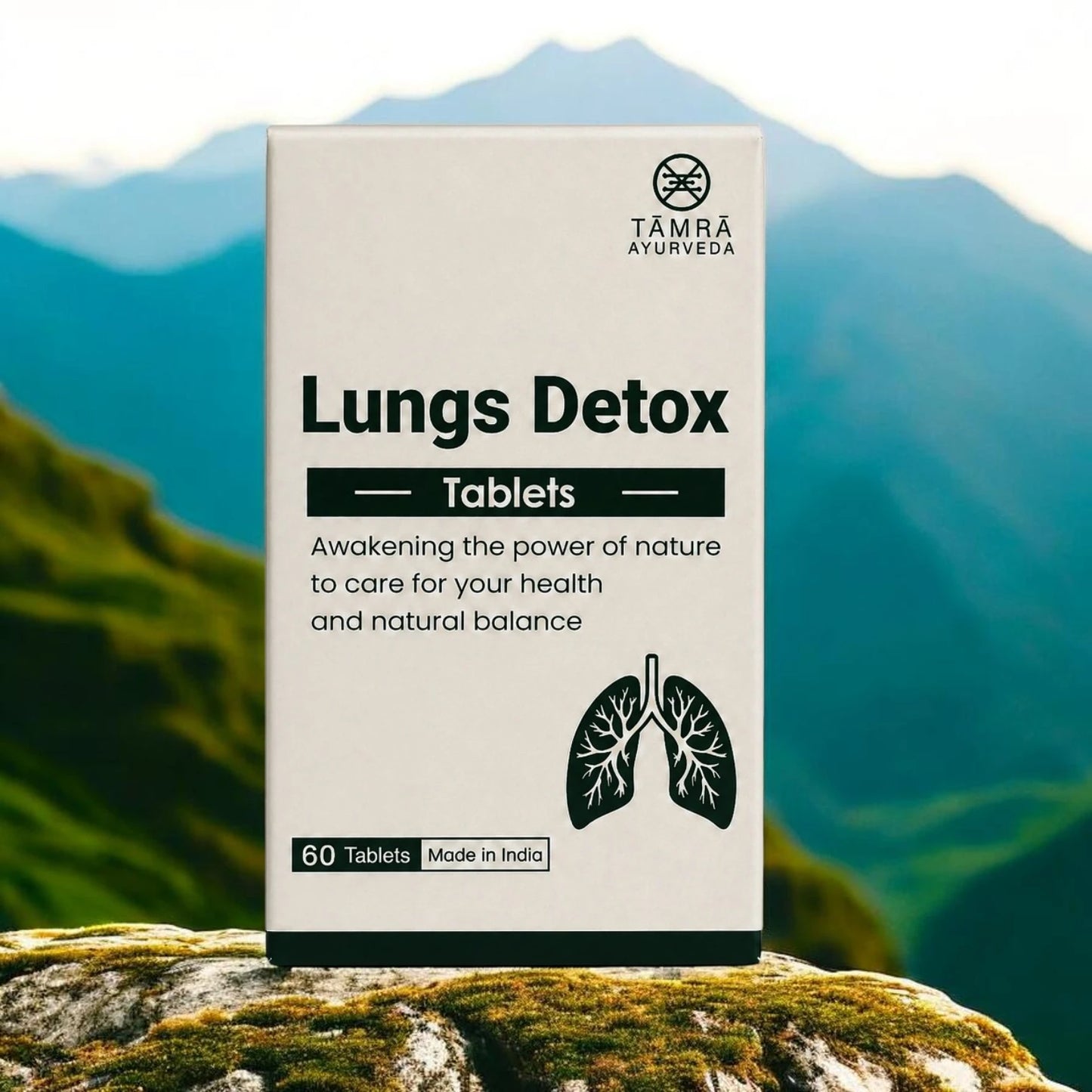 Box of Tamra Ayurveda Lungs Detox Tablets with a mountainous background