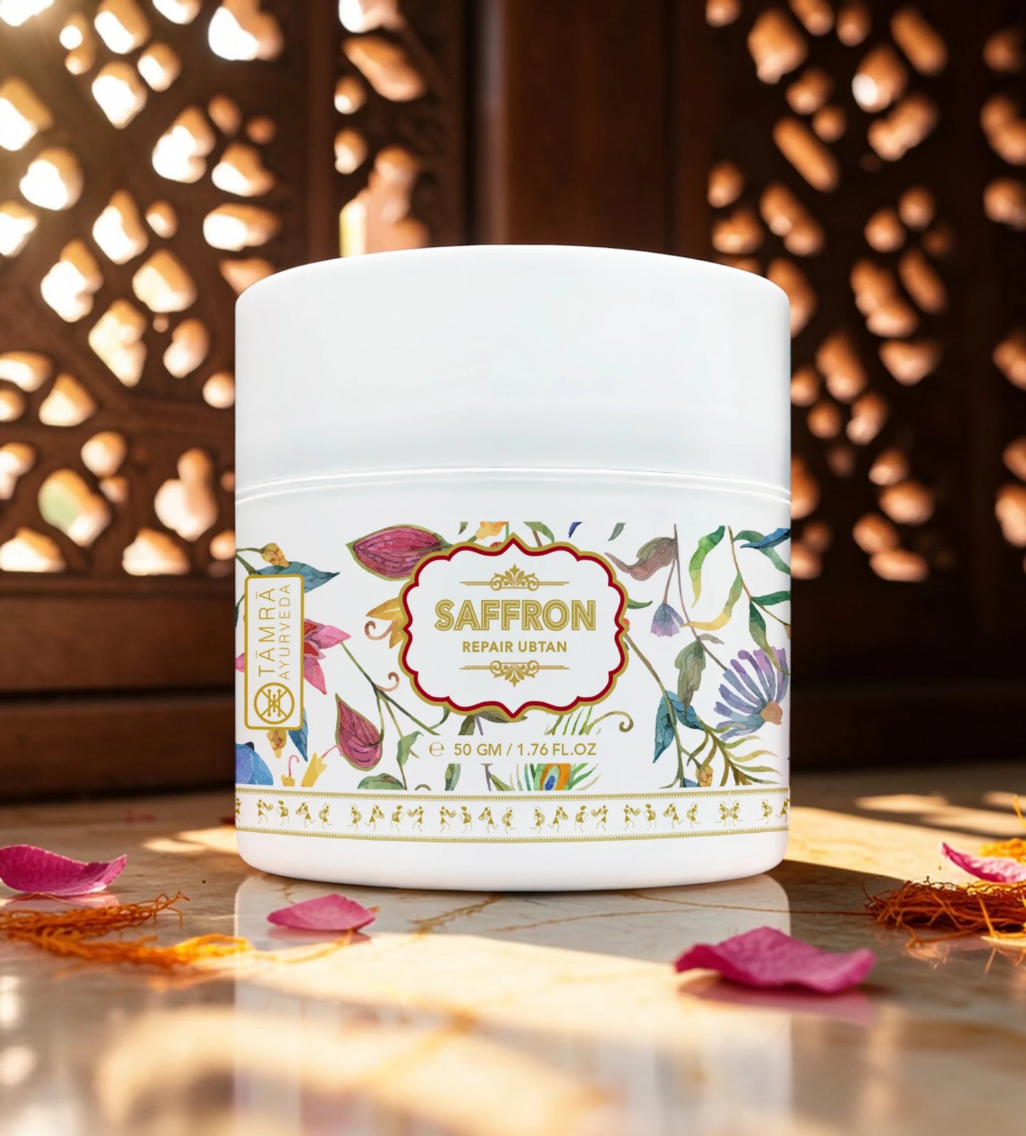 White jar with floral label on a wooden surface with saffron strands and petals.