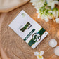 Tamra Tagara 30 Capsules packaging on a textured surface with flowers and candles