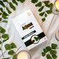 Box of Tampa Ajaina Capsule with green leaves and candles on a white surface