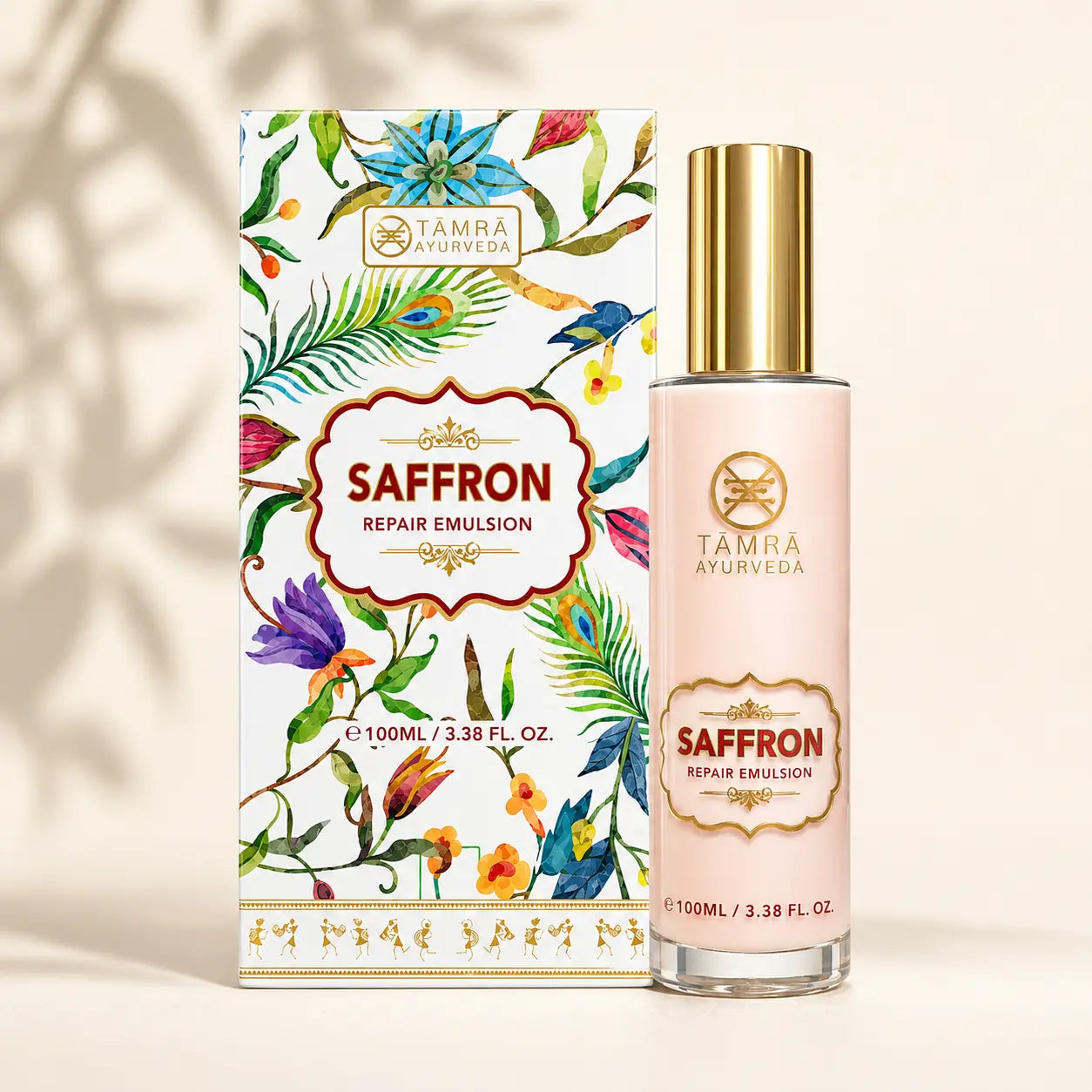 Saffron repair emulsion bottle and packaging with floral design on a beige background