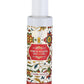 Body lotion bottle with floral design and pump on a white background