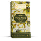 Ylang Ylang essential oil packaging with floral design on a white background