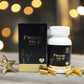 Frigid Fix capsules and packaging on a wooden surface with decorative lights in the background