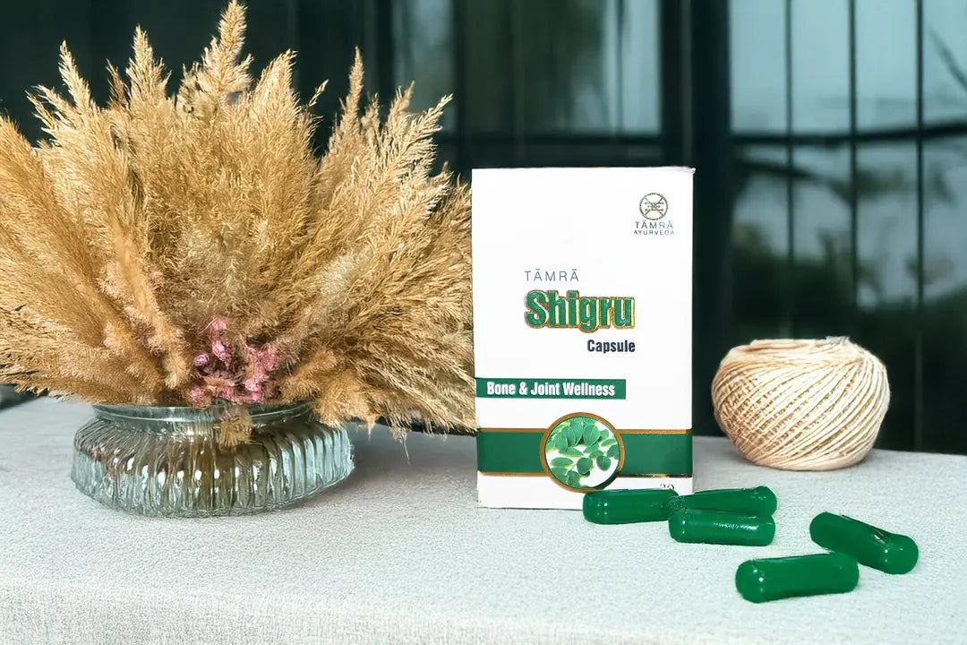 Shigru capsules packaging with green capsules on a light surface with decorative elements.