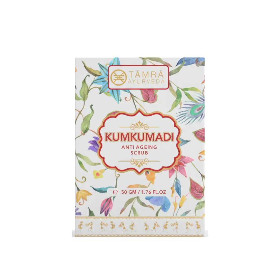 Tamra Ayurveda Kumkumadi anti-ageing scrub packaging with floral designs on a white background