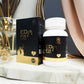 ED Fix+ capsule bottle and packaging on a marble surface with decorative elements.