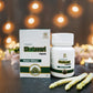 Tamra Shatavari capsules and packaging on a dark surface with blurred lights in the background