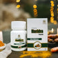 Tamra Ayurveda Haridra capsule bottle and packaging on a table with turmeric and candles.